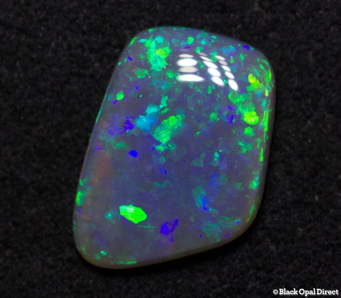 0.87 ct semi black opal 9x6x2mm