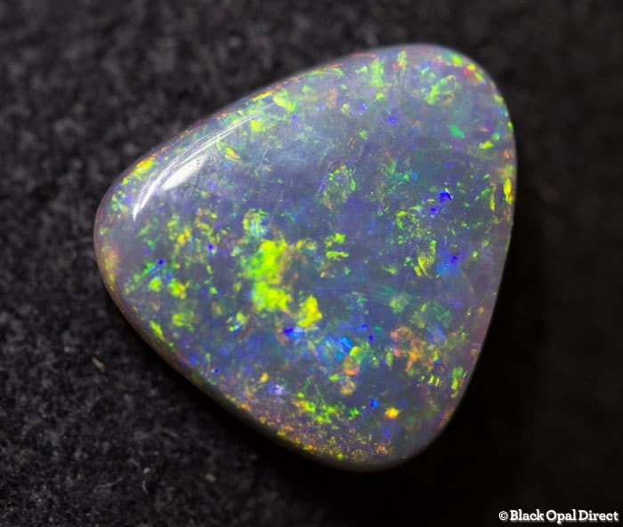 0.87 ct triangle shaped opal double sided 8x7x2mm