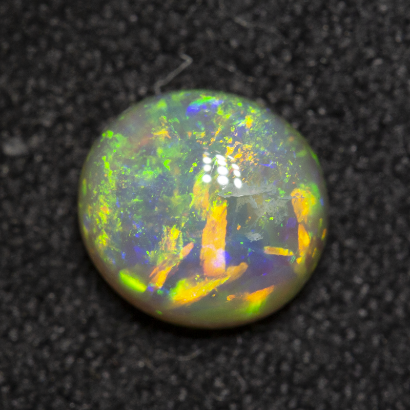 0.88 ct crystal opal 6.7x6.2x3.6mm