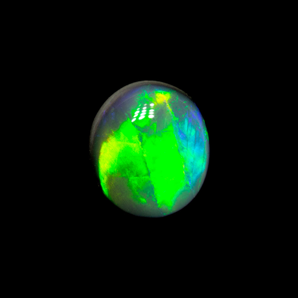 0.88 ct gem black opal 6.5x5.8x3.3m