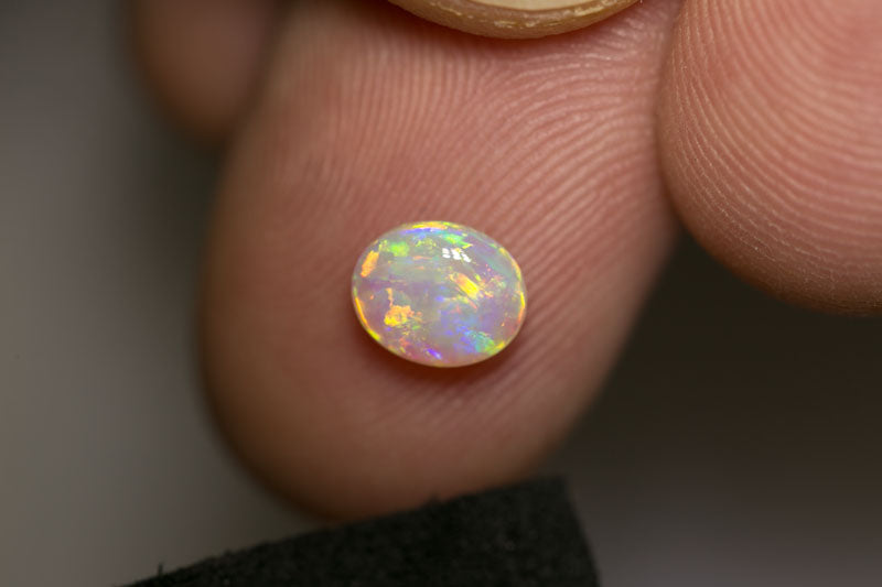 0.88 ct crystal opal 7x6x3mm