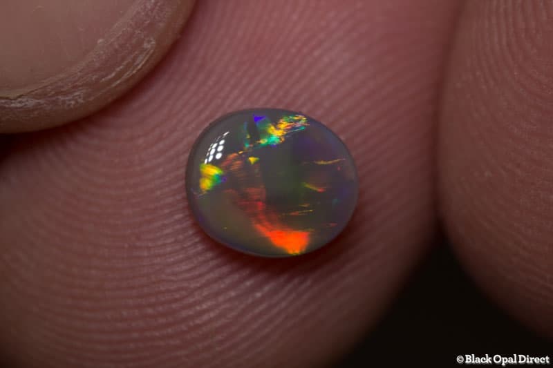 0.89 ct semi black opal 7.5x6.5x3mm