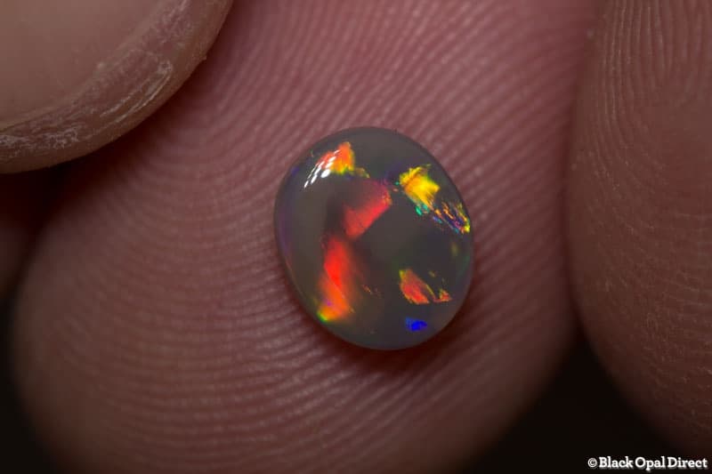 0.89 ct semi black opal 7.5x6.5x3mm