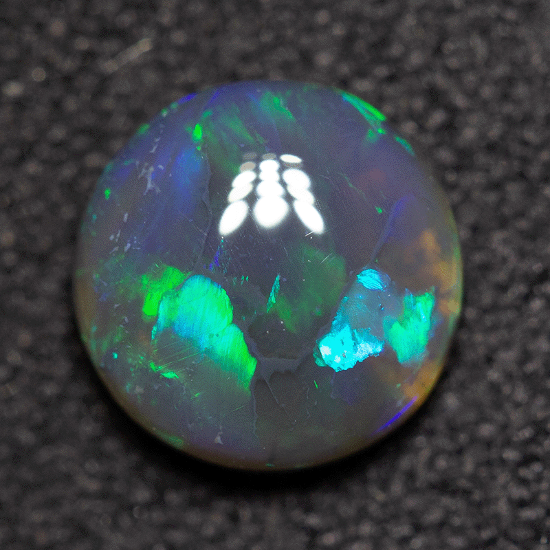 0.90 ct black opal 6.9x6.8x3.1mm