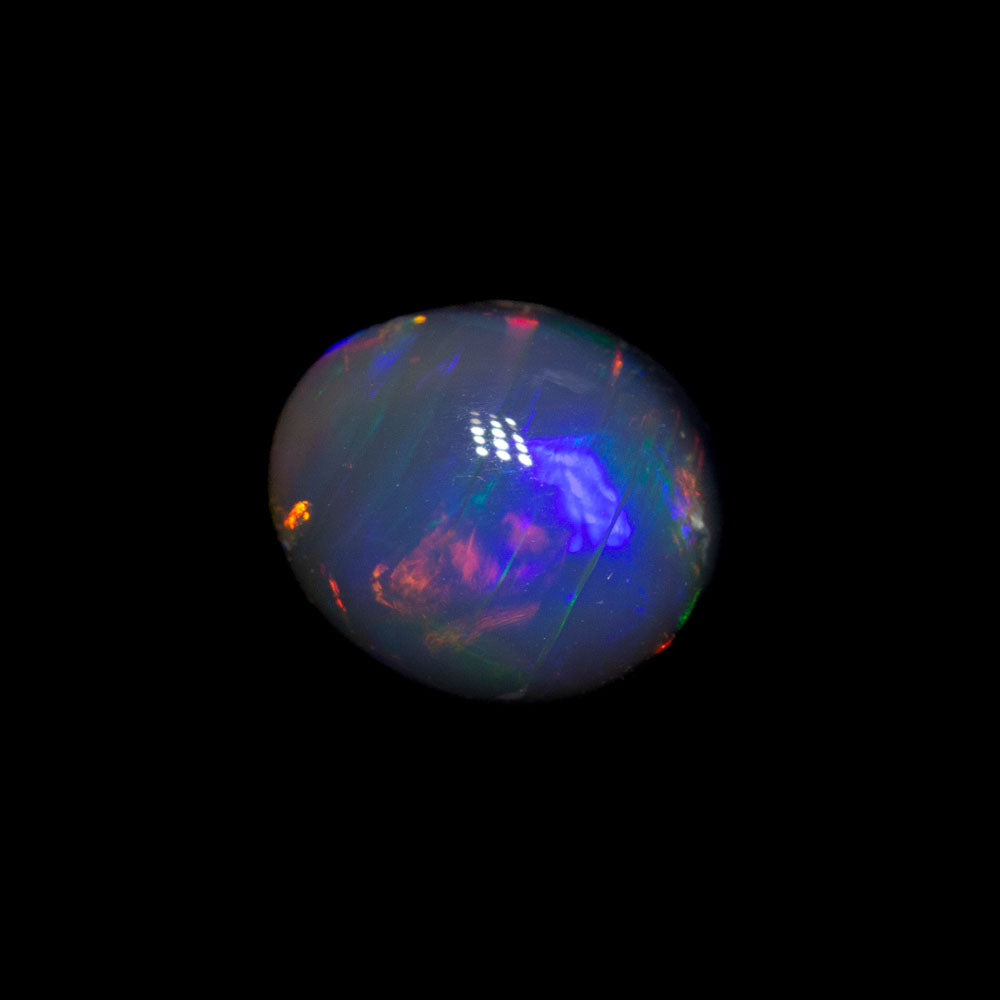 0.90 ct black opal 6.7x5.6x3.9mm