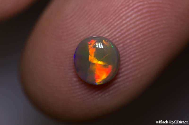 0.90 ct semi black opal 6.5x6.3mm