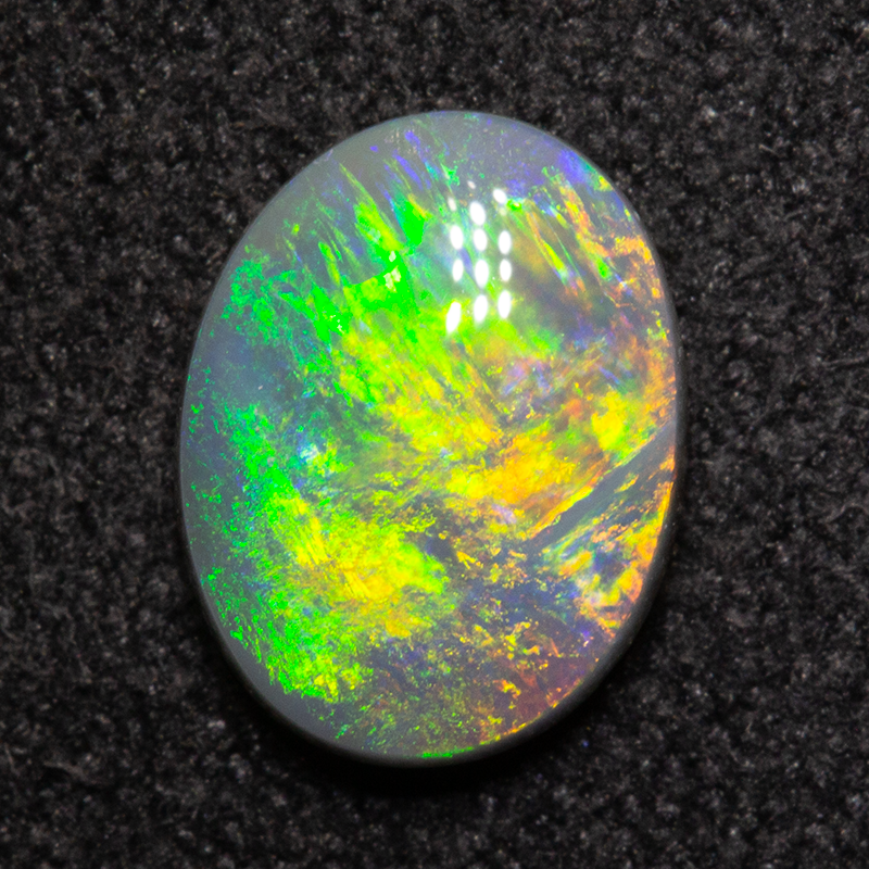 0.91 ct dark opal 8.2x6.4x2.6mm