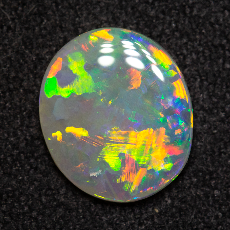 0.91 ct dark opal 9x7.8x2mm
