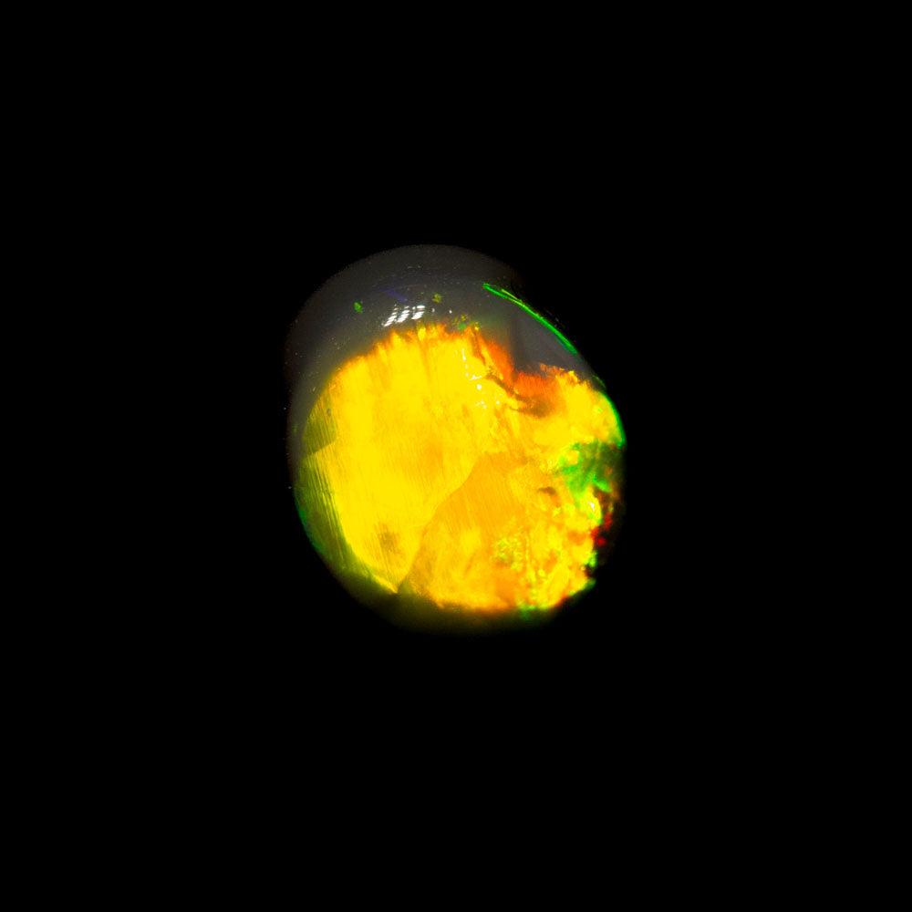 0.91 ct black opal 7.2x5.6x3.1mm