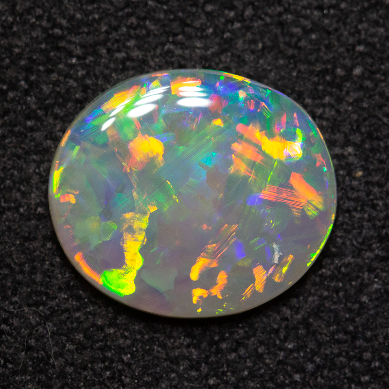 0.91 ct dark opal 9x7.8x2mm