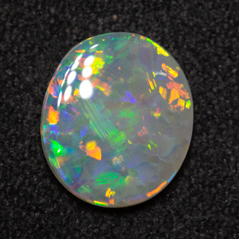 0.91 ct dark opal 9x7.8x2mm