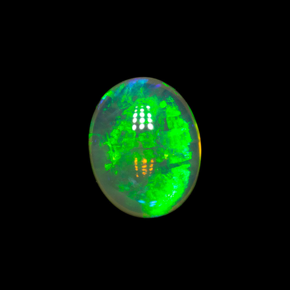0.91 ct double-sided crystal opal 7.5x5.9x3.2mm
