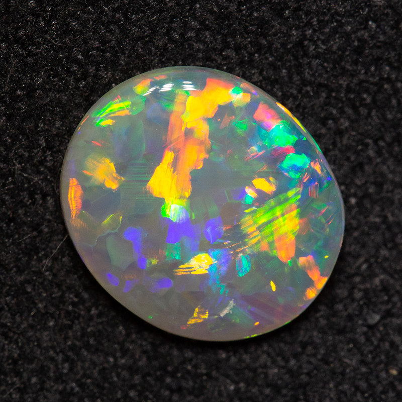 0.91 ct dark opal 9x7.8x2mm