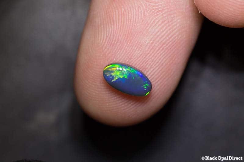 0.91 ct black opal 8.6x5x3mm