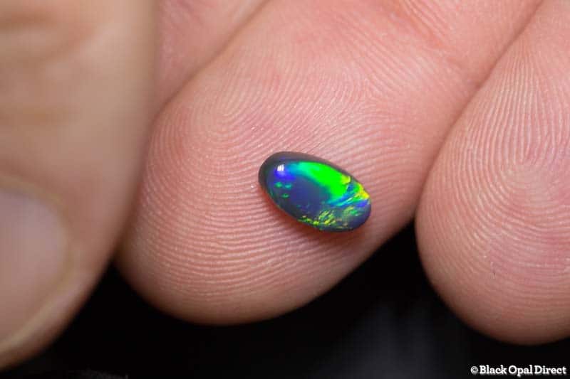 0.91 ct black opal 8.6x5x3mm