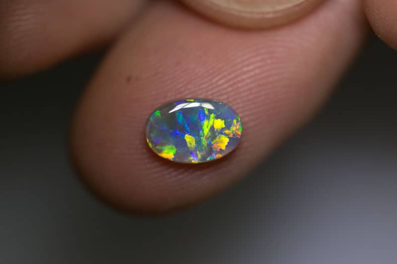 0.91 ct dark opal gem 9x6x2mm
