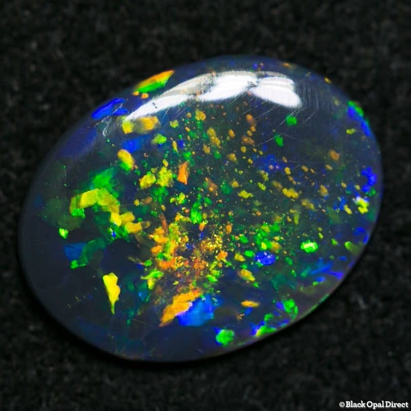 0.92 ct black opal gem 11x8.5x1.5mm