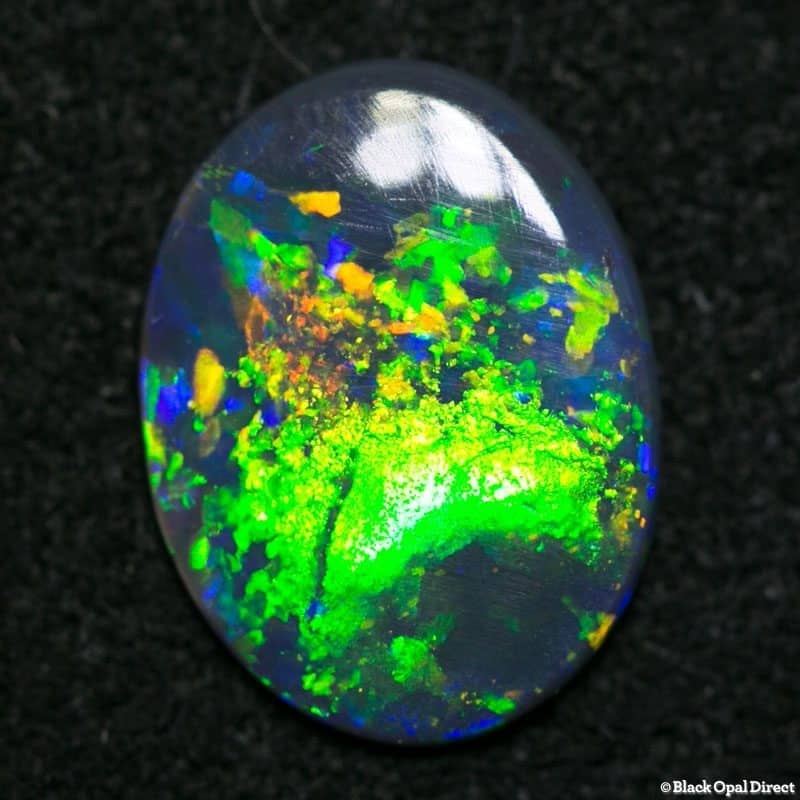 0.92 ct black opal gem 11x8.5x1.5mm