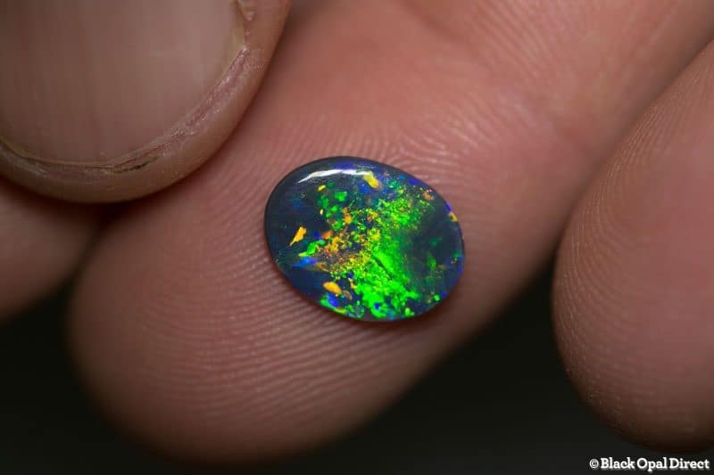 0.92 ct black opal gem 11x8.5x1.5mm