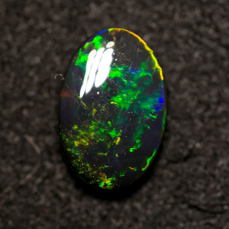 0.92 ct black opal 8.5x6x3mm