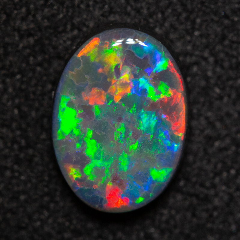 0.93 ct black opal 8.4x6.2x2.6mm