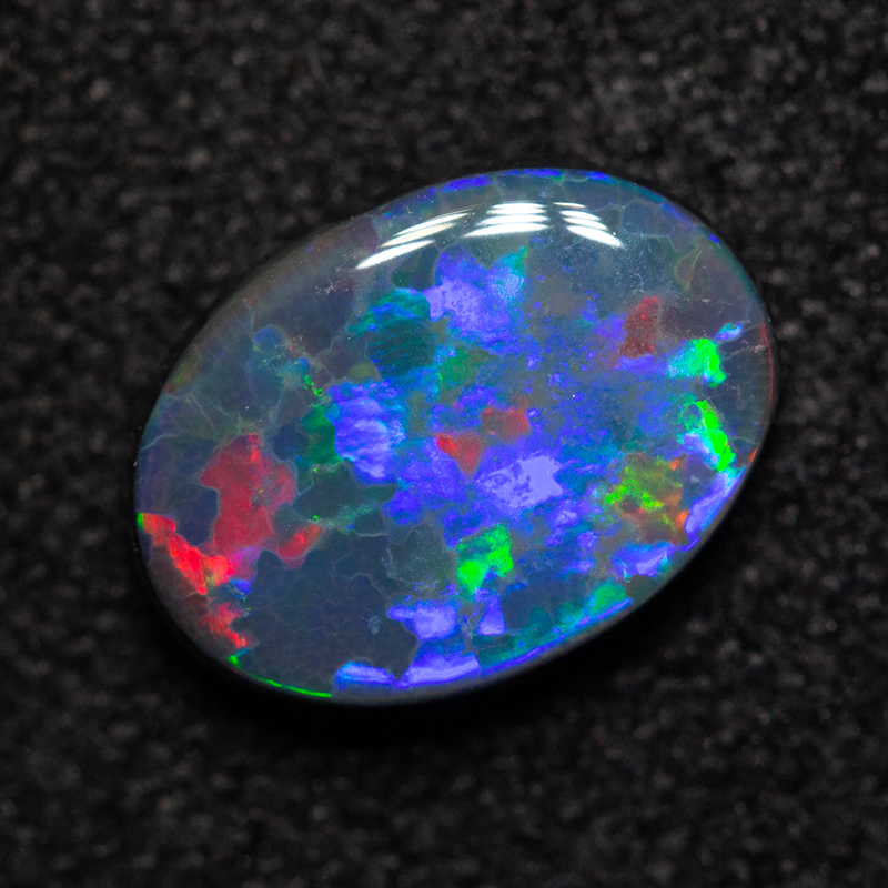 0.93 ct black opal 8.4x6.2x2.6mm