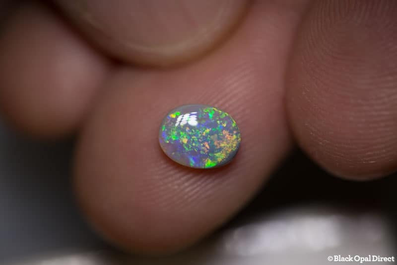 0.93 ct semi black opal 8x6x3mm