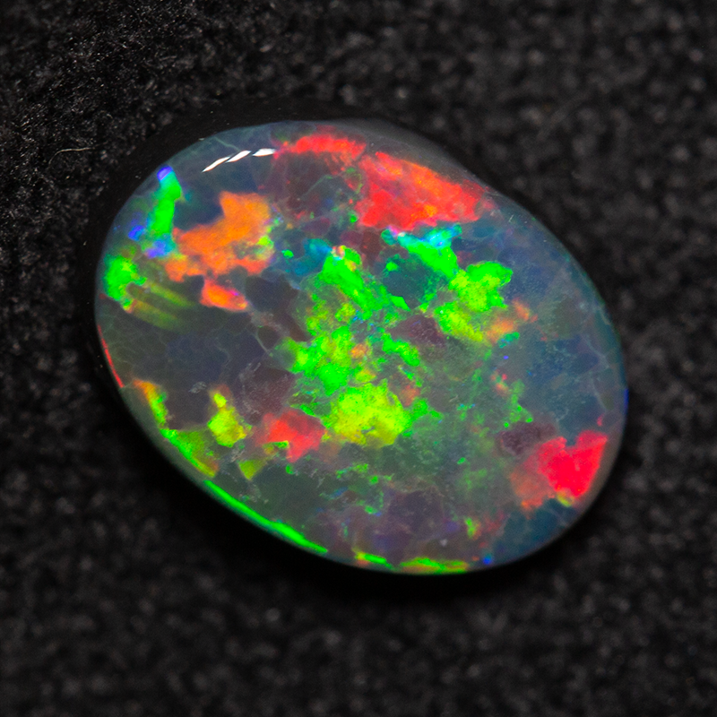 0.93 ct black opal 8.4x6.2x2.6mm