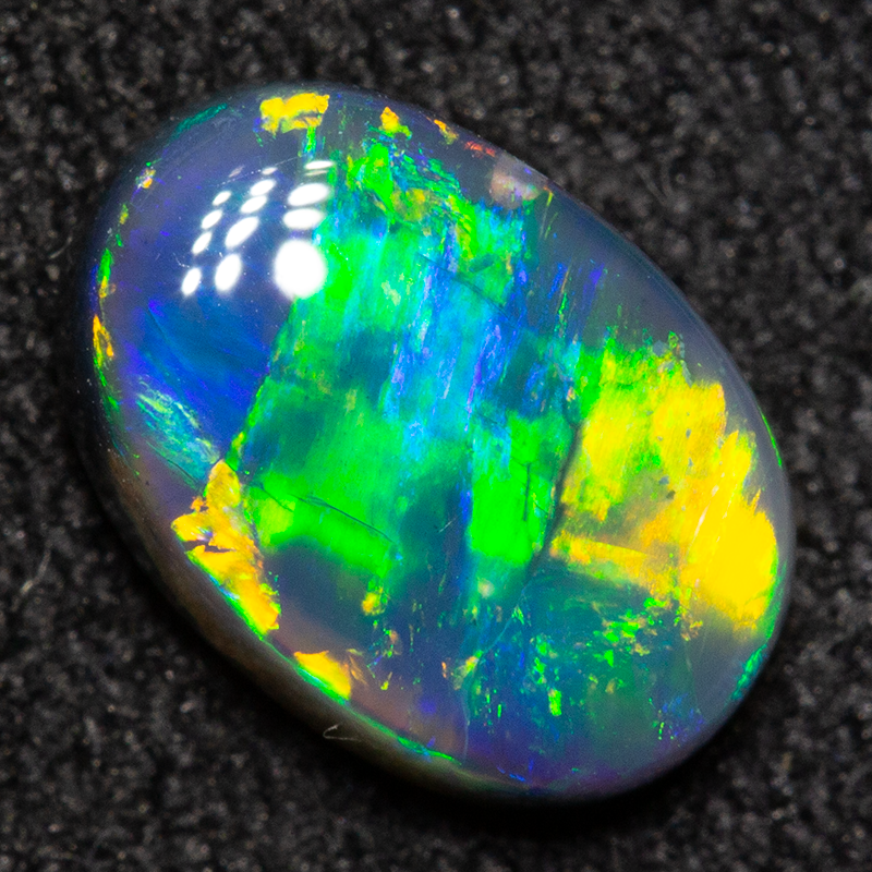 0.94 ct black opal 8x5.6x2.9mm