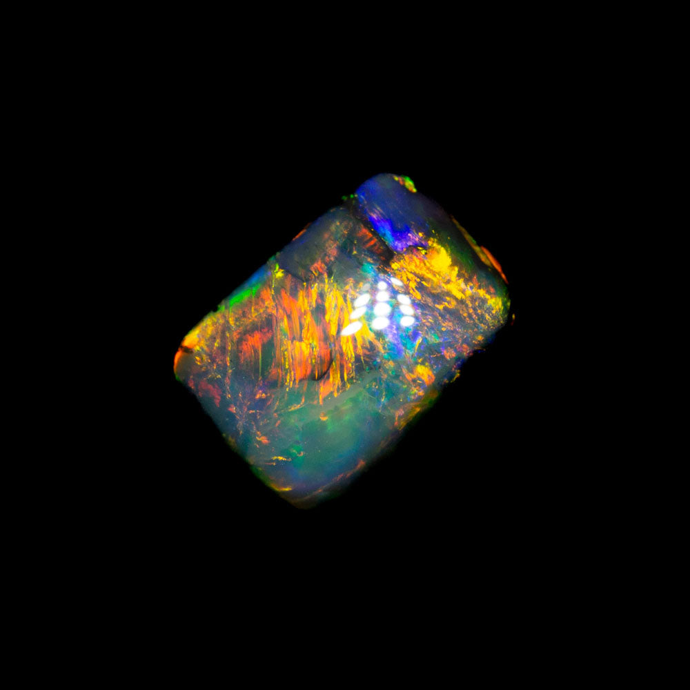 0.94 ct dark opal 6.8x4.8x3.7mm