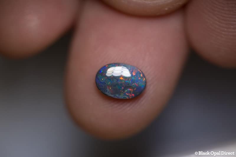 0.94 ct black opal 8x6x2.5mm