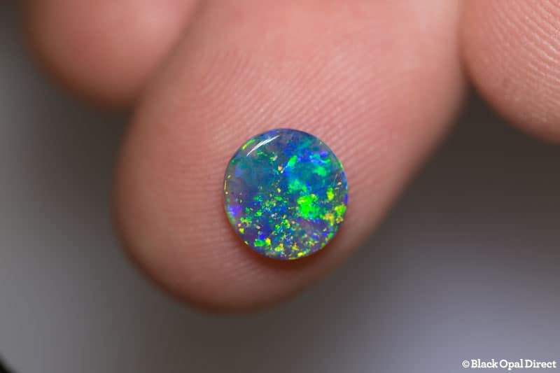 0.94 ct black opal 8.5x8x2mm
