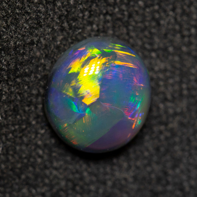 0.95 ct gem black opal 6.9x6.3x3.5mm