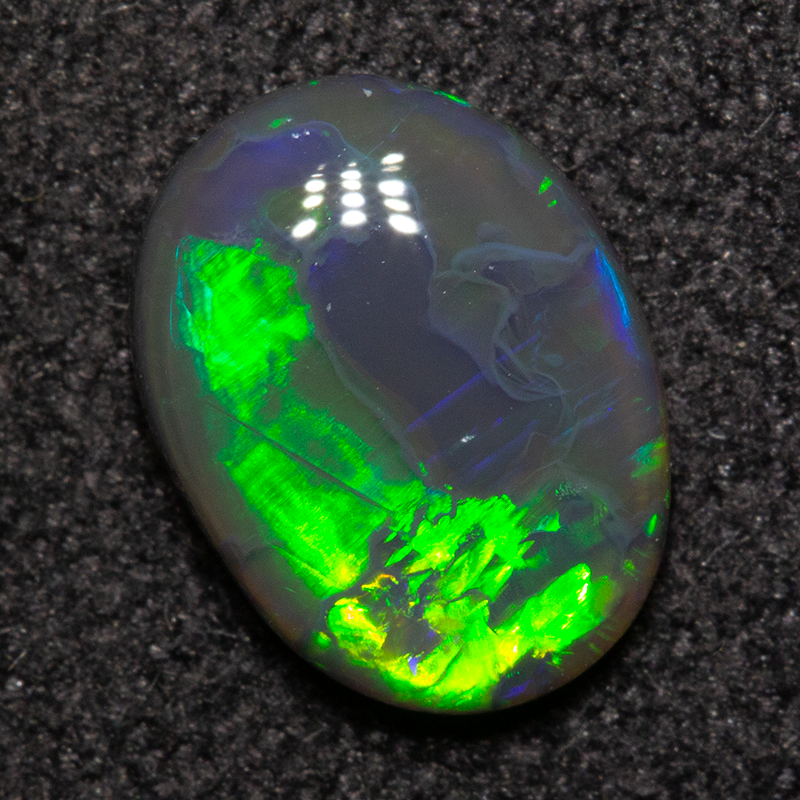 0.95 ct black opal 8.6x6.5x2.6mm