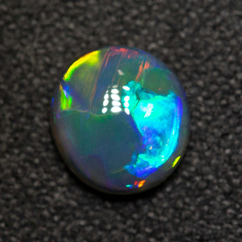 0.95 ct gem black opal 6.9x6.3x3.5mm