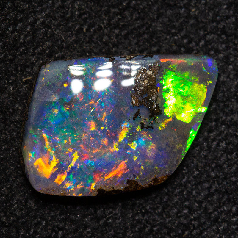 0.95 ct boulder opal 8.6x6.6x1.9mm