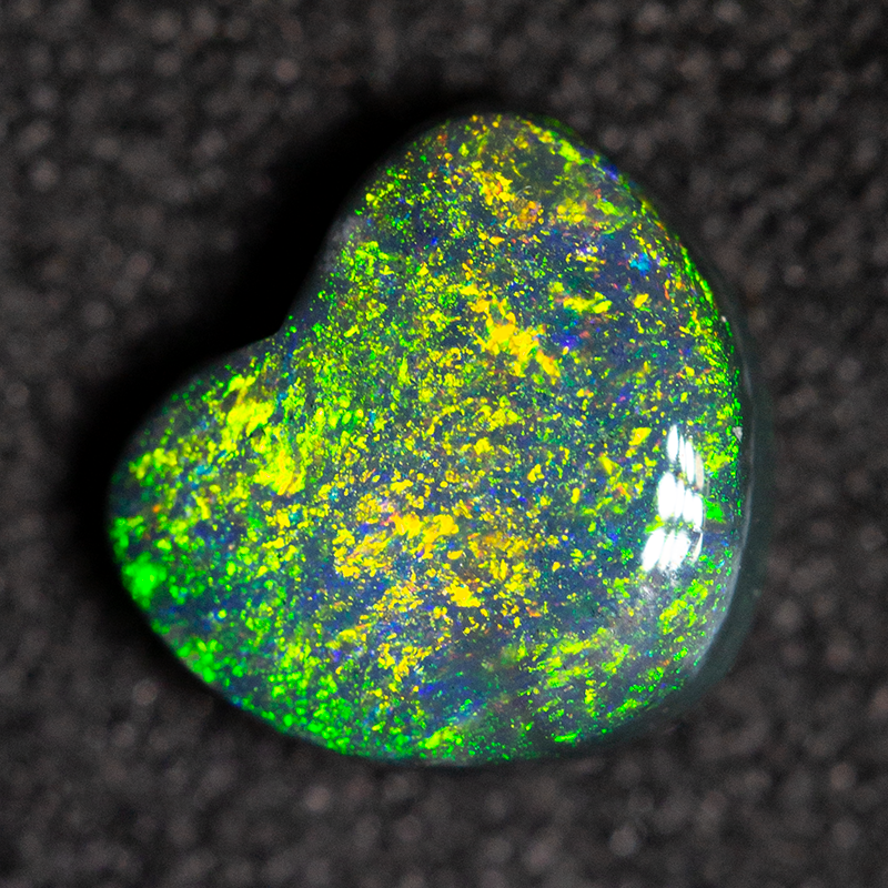 0.95 ct black opal 6.6x7.1x3.2mm