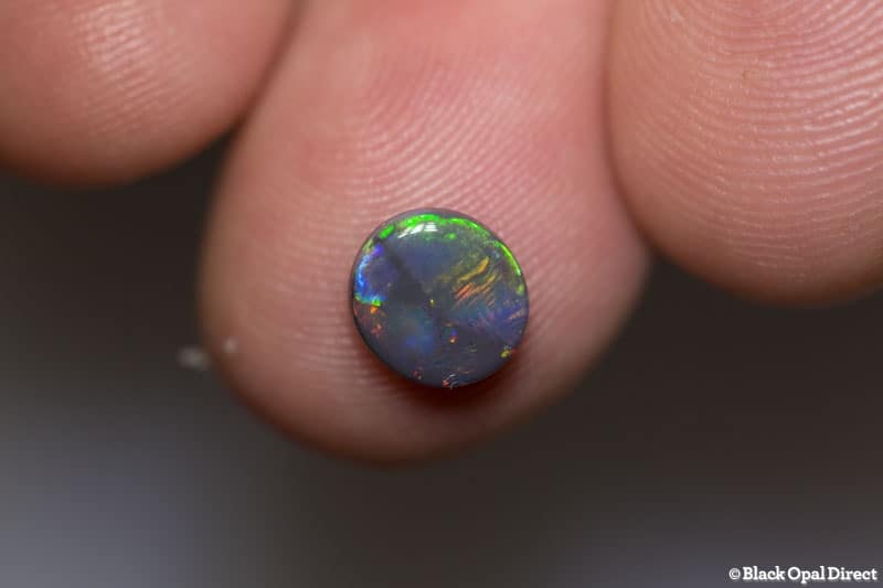 0.95 ct black opal 8x7x2mm