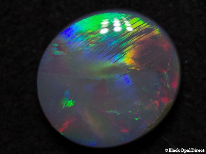 0.95 ct semi black opal 7.5x7x3mm