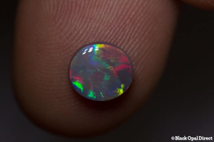 0.95 ct semi black opal 7.5x7x3mm