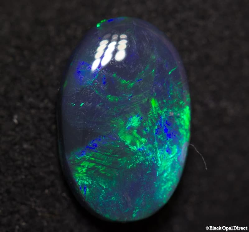 0.96 ct black opal 9x6x2mm
