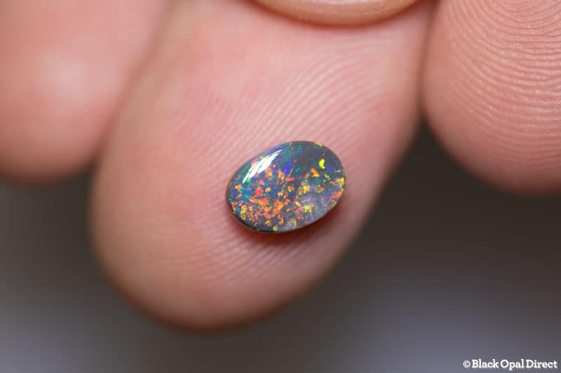 0.96 ct black opal 8x5.5x3mm