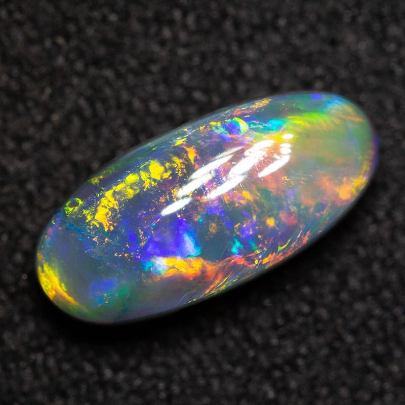0.97 ct black opal 9.3x4.2x3.5mm