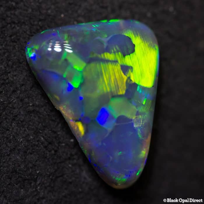 0.98 ct black opal 9x7x2.5mm