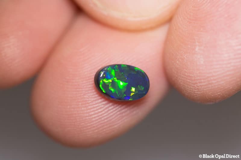 0.98 ct black opal 8.5x5.5x2.5mm