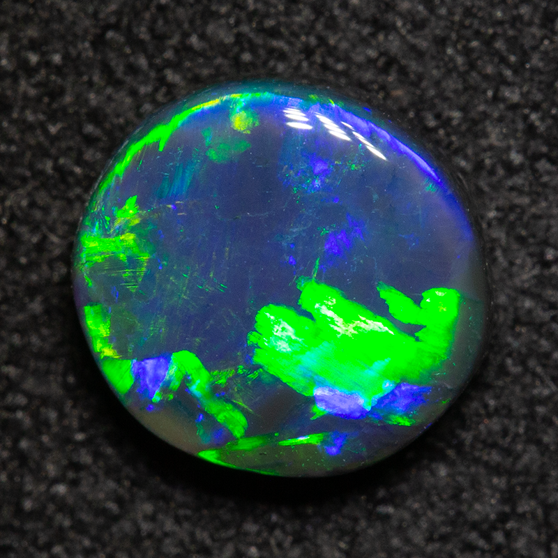 0.99 ct black opal 7.1x6.7x3mm