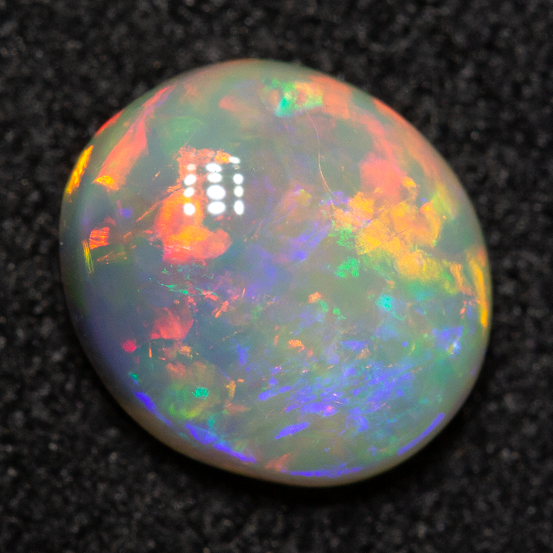0.99 ct crystal opal 7.5x6.7x3.4mm