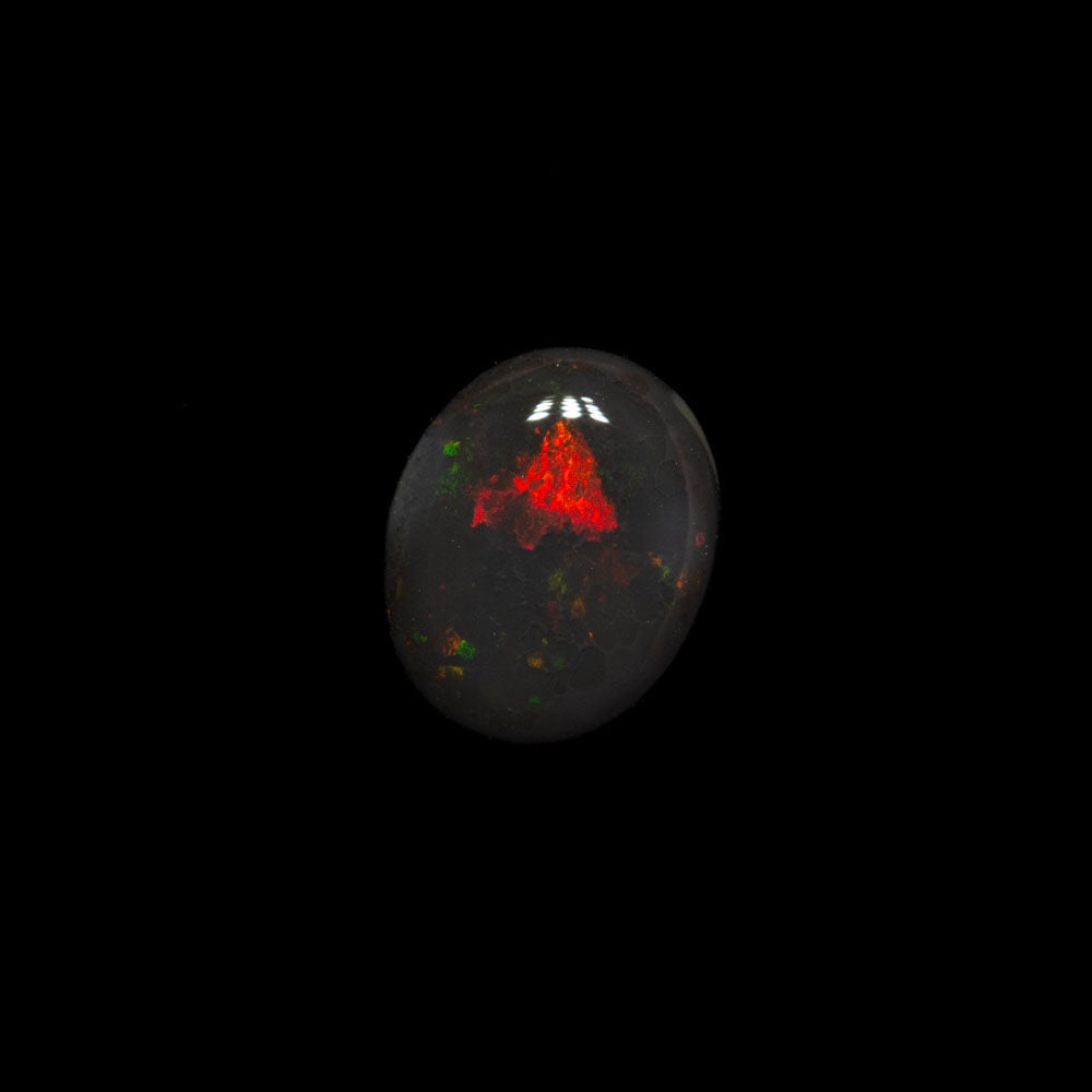 0.56 ct double-sided black opal 6.4x5.2x2.3mm