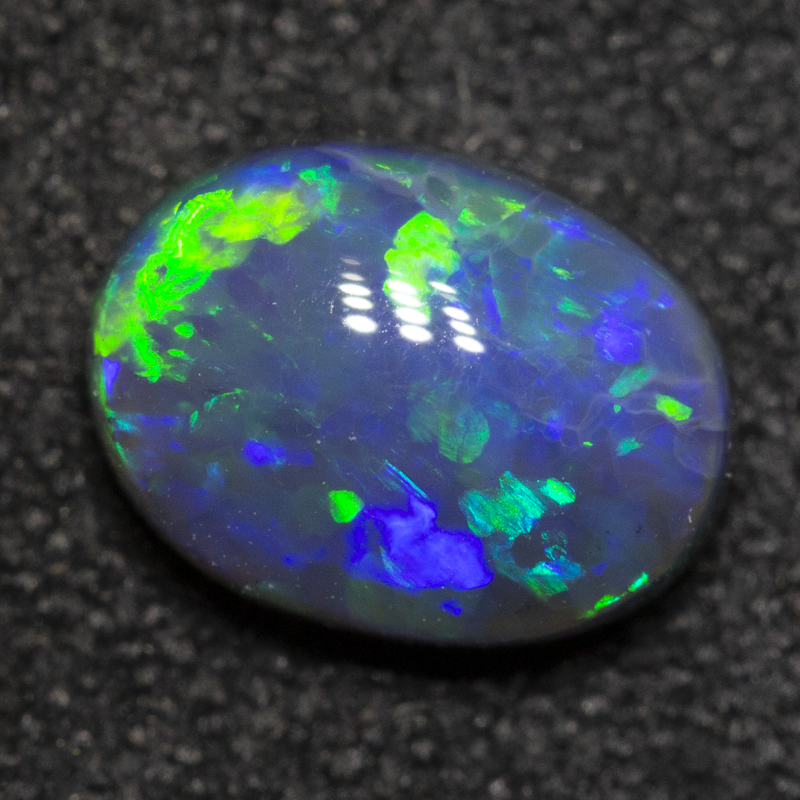 1.00 ct black opal 7.6x5.7x3.7mm