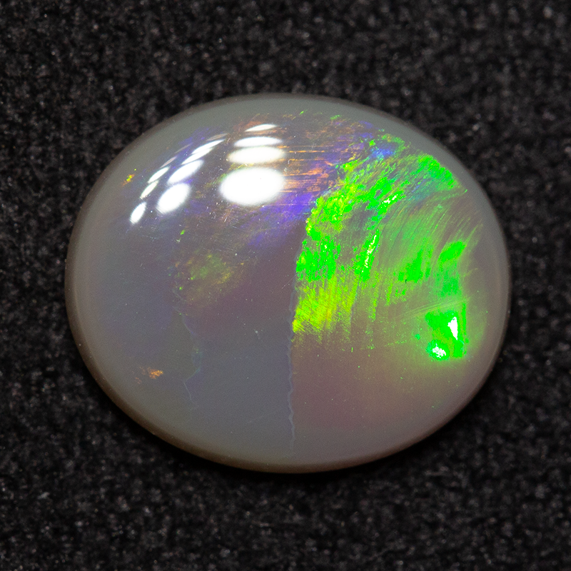 1.03 ct dark opal 9.2x7.8x2.1mm